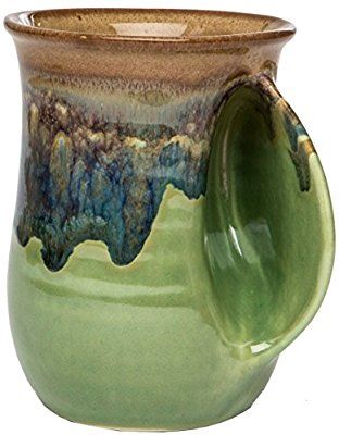 Amazon.com | Clay in Motion Handwarmer Mug - Mountain Meadows - Right Handed: Coffee Cups & Mugs Smith Teamaker, Fruit Company, Mountain Meadow, Wine Gift Baskets, Tea Sampler, Christmas Store, Pottery Designs, Coffee Roasters, Pottery Studio