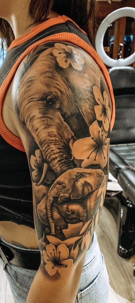 Elephant Quarter Sleeve Tattoo, Elephant And Clock Tattoo, Elephant Leg Sleeve Tattoo, Tattoo Ideas Female Sleeve Elephant, Elephant Clock Tattoo, Upper Arm Elephant Tattoos For Women, Half Sleeve Tattoos For Women Upper Arm Elephant, Realistic Elephant Tattoo With Flowers, 4 Elephant Family Tattoo