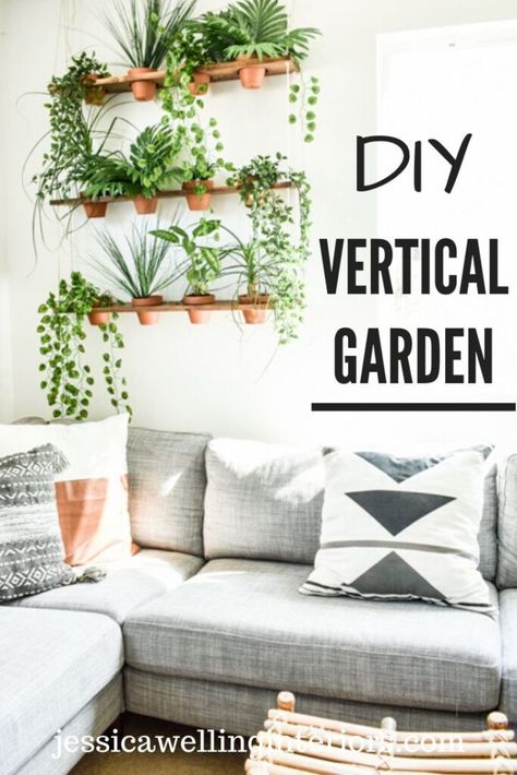 Build a unique indoor DIY vertical garden for your faux plants. This hanging garden living wall is the perfect thing to add Boho style to your home or apartment. Wall Hanging Plants Indoor, Diy Vertical Garden, Ikea Sectional, Living Wall Planter, Plants Hanging, Vertical Garden Indoor, Garden Walls, Vertical Garden Diy, Hanging Plants Indoor