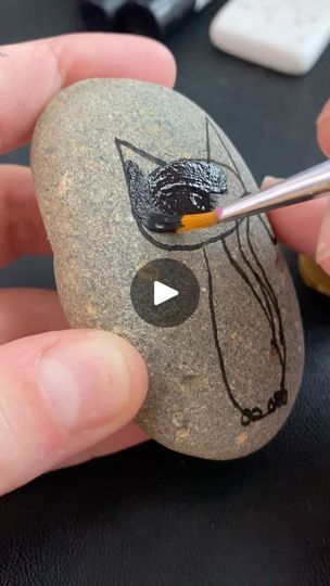 67K views · 933 reactions | 🖤 How to Paint a Black Cat  🖤 https://youtu.be/qaNFWlK-Cus  🖤 #halloweendoodle #halloweenrocks #stonepainting #rockpaintingideas #halloweencraft | Rock Painting 101 | Rock Painting 101 · Original audio Halloween Witch Painted Rocks, Pet Rocks Craft, Halloween Rock Painting Ideas, Painting Cats, Drawing Rocks, Halloween Videos, Painting 101, Pet Rock, Witch Crafts