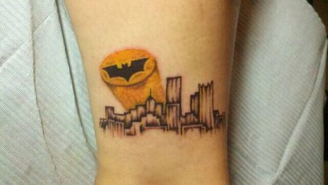 Pittsburgh skyline with bat-signal tattoo Calvin And Hobbes Tattoo, Pittsburgh Tattoo, Geometric Wolf Tattoo, Comic Book Tattoo, Video Game Tattoos, Penguin Tattoo, Batman Tattoo, Cool Tattoo, Joker Tattoo