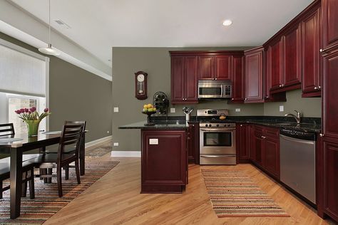 Kitchen Paint Colors With Cherry, Dark Oak Cabinets, Cherry Wood Kitchen Cabinets, Popular Kitchen Colors, Cherry Wood Kitchens, Dark Wood Kitchen Cabinets, Cherry Wood Cabinets, Trendy Kitchen Colors, Paint For Kitchen Walls