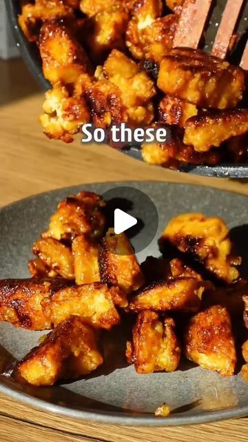 theveganideas on Instagram: "GOLDEN TOFU BITES 🌱 @Theveganideas  Follow us @Theveganideas 🌱 for more vegan recipes  RECIPE (3-4 servings, 15min prep time) -400g tofu Pat dry and tear in bite sized pieces. -2 Tbsp corn starch -1 Tsp salt Toss it. Fry in oil until crispy. Glaze: -4 Tbsp agave or maple syrup -juice of 1 small lemon -1 Tsp each paprika, ground coriander, cumin -1/2 Tsp each chili powder garlic powder -salt to taste -1-2 Tbsp water Mix and add to the tofu. Stir and fry for 2-3mins until nicely glazed. . . .    #veganburgers #veganvideos #planteater #vegetarianmealprep #plantbasedsnacks #recetasveganas  #vegetariskt #veganbreakfastideas #veganmacncheese #veganmeal #plantbasedfoods #vegannoodles #vegansnack #plantbasedmeals #veganweightloss" Golden Tofu Bites, Keto Tofu Recipes Easy, Tofu Recipe Ideas, Tofu Recipes Videos, Medium Firm Tofu Recipes, Tofu Videos, Tvp Recipes, Tofu Dessert, Best Tofu Recipes