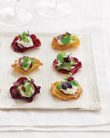 For a finger-friendly take on classic beet and goat cheese salad, serve fried beet chips topped with a dollop of the tangy cheese and vinaigrette-laced microgreens. They make perfect hors d'oeuvres -- crispy instead of juicy beets means no one will be caught red-handed. Canape Ideas, Beet Chips, Goat Cheese Appetizer, Beet And Goat Cheese, Whipped Honey, Small Appetizers, Goat Cheese Salad, Cheese Salad, Cheese Appetizers