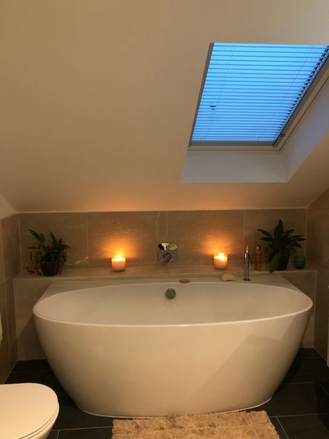 Bathroom With Low Slanted Ceiling, Bath Under Sloped Ceiling, Bath Under Velux Window, Slanted Ceiling Bathroom Tubs, Bath Under Eaves Slanted Ceiling, En Suite Sloping Ceiling, Loft Bathroom Ideas Sloped Ceiling With Bath, Bath Under Sloping Roof, Sloped Roof Bathroom