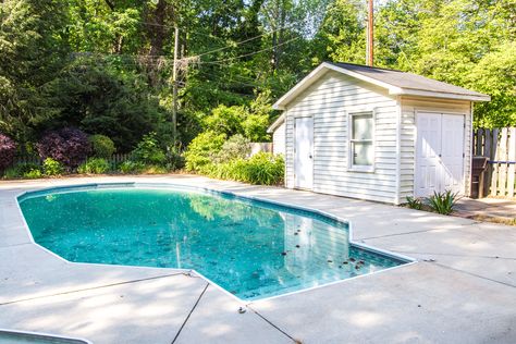 A breakdown of options to upgrade a basic, outdated vinyl liner in-ground pool and ideas to improve a backyard for beauty and function. Inground Vinyl Pool Ideas, Before And After Pool Backyards, Tan Pool Liner, Vinyl Pool Liner Colors In Water, Vinyl Inground Pool, Brick Exterior Makeover, Limewash Brick Exterior, Wooden Outdoor Table, Pool Makeover