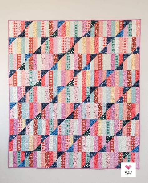 Happy Stripes is a jelly roll and a layer cake friendly quilt pattern from Emily Dennis of quiltylove.com. This pattern includes instructions for Baby, Small Throw, Medium Throw, Large Throw, Twin, Full, Queen or King size and includes two bonus patterns that you can make using the cut off half square triangles! It's a true stash buster! #modernquilt #quilting #happyquilt Happy Stripes Quilt, Quilt Beginner, Stripe Quilt Pattern, Machine Binding A Quilt, Stripes Quilt, Hearts Quilt, Quilty Love, Strip Quilt Patterns, Granny Square Quilt