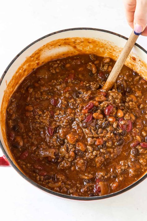 This hearty Halftime Chili is deliciously seasoned and chock full of beef, beans, and beer! Get all the work done in advance so you don't miss a minute of the next big game. #chili #beer #beerchili #gameday #footballfood #comfortfood Pale Ale Chili Recipe, Beer Chili Recipe No Beans, Chili Recipe With Beer And Cocoa, Best Beer Chili Recipe, Beef And Beer Chili, Chili With Beer Recipe, Beer Chili Recipe Crockpot, Boston Beer Chili 12 Tomatoes, Boston Beer Chili