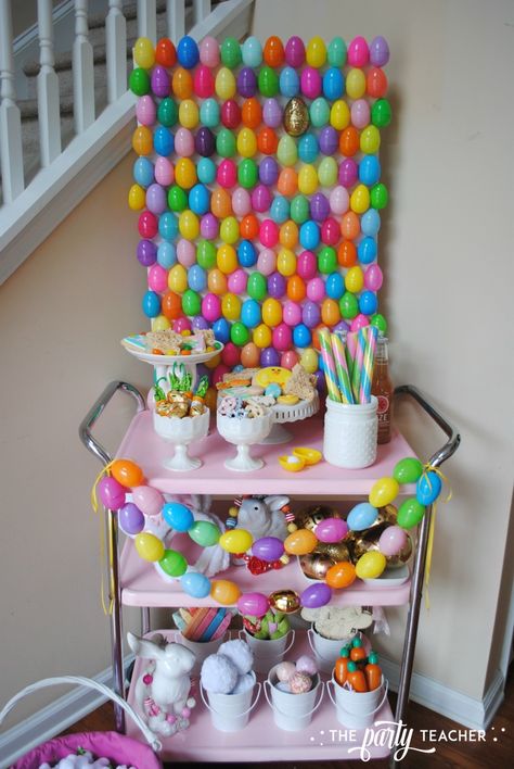 Easter Bar Cart by The Party Teacher - bunny buffet with Easter egg backdrop Easter Egg Backdrop, Diy Easter Backdrop Ideas, Easter Bar Cart, Bar Cart Styling Ideas, Easter Kids Table, Easter Bars, Family Easter Party, Easter Candy Bar, Easter Party Ideas