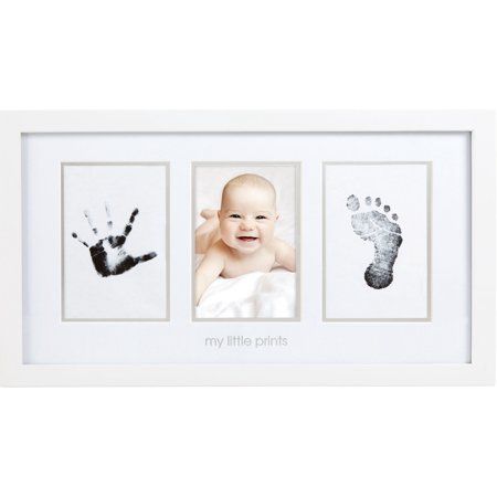 Capture and cherish your little ones prints forever with Pearheads babyprints photo frame. This modern white, wooden frame includes everything you need to create a personalized keepsake with your newborns tiny prints. It includes 2 clean-touch ink pads ensuring babys hands and feet will never touch the ink! To create an impression, make sure the ink is facing down on the included white cards and press your baby's hand and foot separately onto the clean-touch ink pad. Your babys tiny prints will Baby Registry Items, Baby Art Projects, Baby Handprint, Picture Poster, Baby Frame, Poster Decor, Tiny Prints, Handprint Art, Baby Hands