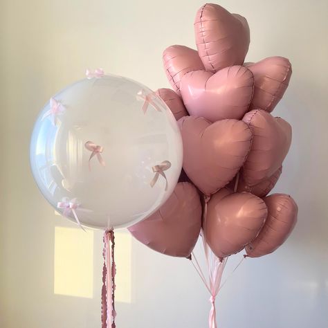 Enhance your birthday or bow party with these sophisticated balloons. Ideal for a Romantic themed celebration, girls' night, Bachelorette or any Coquette themed party. Create a stunning atmosphere by pairing them with our Pink Numbers or add Pink and White Latex Balloons for a professional-looking decor. Make your party unforgettable with these elegant balloons. Great for setting the scene as a Pro.  𝐂𝐡𝐨𝐜𝐤𝐢𝐧𝐠 𝐇𝐚𝐳𝐚𝐫𝐝: Children can choke or suffocate on uninflated or broken balloons. Pink Party Decorations Outdoor, Bow Balloon Decorations, Bow Decor Party, Balloon With Bow, Baby Pink Party Decorations, Taylor Swift Balloon Bouquet, Bow Themed Party Decor, Bow Birthday Decor, Pink Coquette Birthday Party