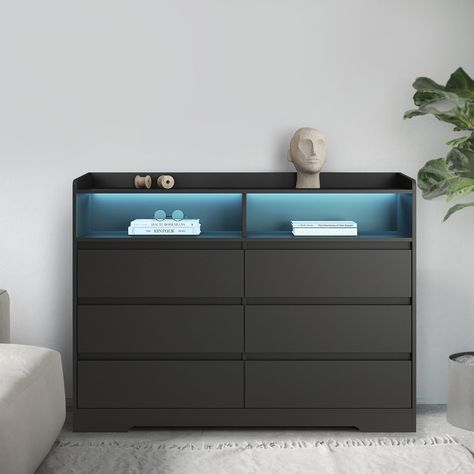 PRICES MAY VARY. 👔 Abundant Storage: Dresser for bedroom with six drawers provide ample space for organizing books, clothes, multimedia gadgets, toys and more, ensuring clutter-free living 💙 Vibrant LED Lighting: Enjoy 16 color options with our Black dresser built-in LED light strip, creating a delightful ambiance to suit any mood or occasion 💯 Durable Construction: Crafted from high-quality E1 grade particle board, our chest of drawers for bedroom guarantees long-lasting strength and resista Black Dressers, Modern Storage Cabinet, Sideboards Living Room, Sideboard Storage Cabinet, Studio Living, Shelves In Bedroom, Wood Dresser, Living Room Cabinets, Modern Dresser