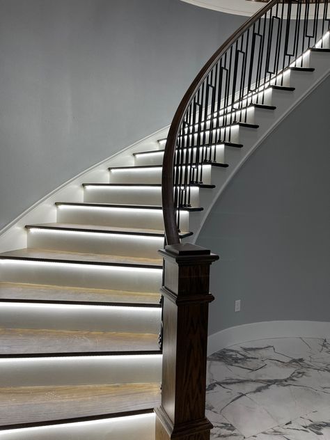 Create a cohesive lighting plan when designing or renovating your space. Spiral Staircase Lighting, Spiral Staircase Outdoor, Light Stairs, Staircase Outdoor, Spiral Stair, Staircase Lighting, Stair Decor, Spiral Stairs, Curved Staircase