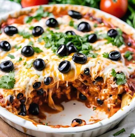 Discover the Ultimate Enchilada Pie Recipe That Will Leave You Craving More | Ridley's Wreckage | NewsBreak Original Enchilada Pie Recipe, Frito Taco Salad, Chicken And Vegetable Bake, Enchilada Pie, Ww Lunch, Carolina Bbq, Carolina Bbq Sauce, Pork Chops And Rice, Blueberry Crisp