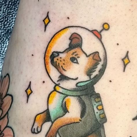 ♡ Glasgow Tattoo Artist ♡ Caitlin ♡ on Instagram: "A little Liaka space puppy for Leanne! Thanks for letting me tattoo this sweet baby 💕🐶 @luckyinlovetattoos  * * #tattoo #tattooideas #tattoos #inked #inkaddict #traditionaltattoo #americantraditional #blackandgreytattoo #colourtattoo #art #illustration #illustrator #tattooartist #topclasstraditional #oldlines #traditionalartist #skinarttraditional #oldworkers #colourful #glasgowtattooartist #glasgowtattoo #dog #dogtattoo" Laika Space Dog Tattoo, Space Dog Tattoo, Cartoon Dog Tattoo, Dog Traditional Tattoo, Laika Tattoo, Angel Moodboard, Lab Tattoo, Me Tattoo, Space Dog