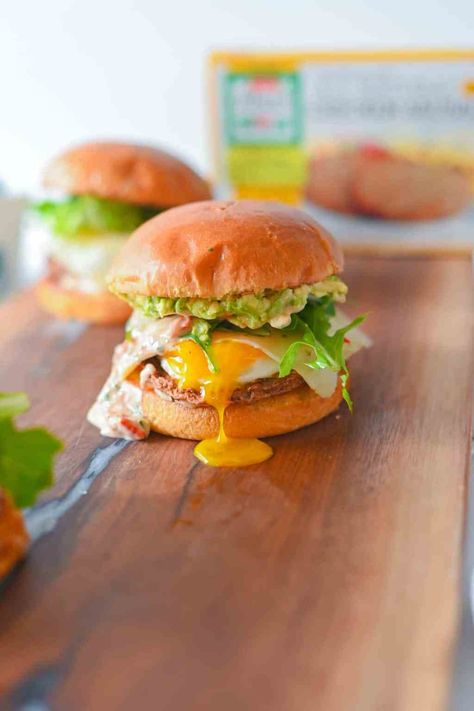 California Sunrise Breakfast Sandwich - that's what she eats. California Sunrise, Sunrise Breakfast, Sausage Muffins, Egg Muffins Breakfast, Over Easy Eggs, California Food, Cilantro Sauce, State Foods, Sausage Patty