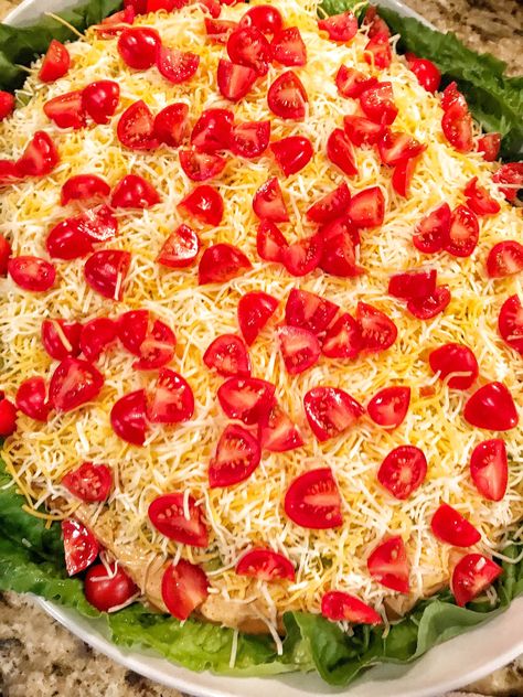 Taco Dip - The Tipsy Housewife Best Taco Dip, Tipsy Housewife Recipes, Southwest Food, Taco Platter, Housewife Recipes, The Tipsy Housewife, Tipsy Housewife, Bbq Party Food, Southwest Recipes