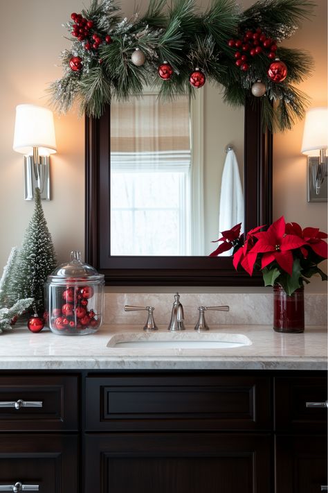 Glass jars filled with ornaments, candy canes, or fake snow are such an easy way to brighten your bathroom. I love how these simple Christmas bathroom decor ideas make the space pop. Add a garland around your mirror or a poinsettia for an extra festive touch. How would you fill your jars? Garland Bathroom Mirror, Garland Around Bathroom Mirror, Candy Cane Bathroom Decor, Christmas Decor For Bathroom Counter, Holiday Mirror Decor, Fake Poinsettia Decorating Ideas, Christmas Decor For Mirrors, Master Bath Christmas Decor, Holiday Bathroom Decor Ideas