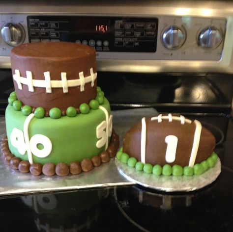 Football Cake 1st Birthday, Small Football Cake, Football Themed Smash Cake Photos, One Year Down Football Birthday Cake, 1st Touchdown Birthday, Football Themed Smash Cake, 2nd Year Down Football Birthday, Football Theme Birthday Cake, Football One Year Old Birthday