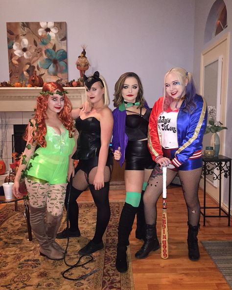 Gotham city costume. Poison ivy, cat woman, the joker, and Harley Quinn take on the world. Group costumes Trio Halloween Costumes Villains, Hero And Villian Costume, Joker Group Costume, Cat Woman And Poison Ivy Costumes, Dc Villain Costumes, Héros And Villians Costume Ideas, Cat Woman Harley Quinn Poison Ivy Costume, Dc Group Costumes, Trio Halloween Costumes Joker