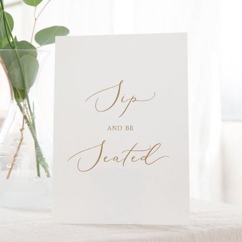 $13.67 | Delicate Gold Calligraphy Sip and Be Seated #sip and be seated sign, modern wedding reception signage, simple wedding bar sign, elegant cocktail pedestal sign, minimalist wedding place card sign, whimsical wedding seating decor, romantic please find your seat, classic chic script typography k200, white and gold wedding sign, classy minimal champagne golden yellow Wedding Seating Decor, Sip And Be Seated, Yellow Typography, Wedding Reception Signage, Romantic Minimalist, Gold Wedding Signs, Modern Wedding Reception, Reception Signage, Gold Calligraphy