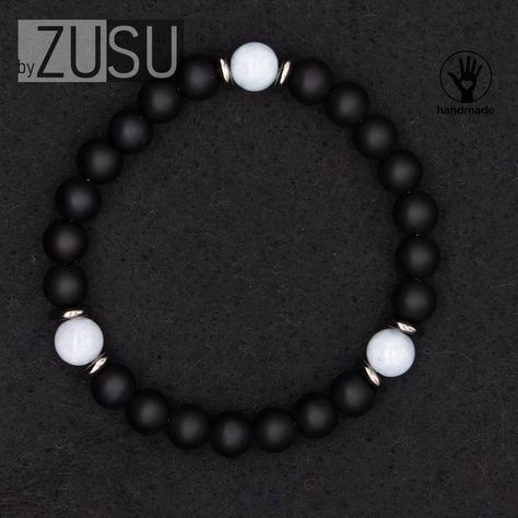 Add a touch of elegance and positivity to your style with this beautiful Aquamarine & Onyx Mens Bracelet. Handmade with natural aquamarine and onyx beads, this bracelet is designed to balance your energy and bring peace to your life. Aquamarine is known for its soothing energy, while onyx provides grounding and stability. The semi-precious stones are hand strung on a strong and stretchy cord, ensuring a comfortable fit for any wrist size. This handmade jewelry piece is perfect for everyday wear Black Bracelet Men, Hope Diamond, Mens Bracelet Black, Mens Silver Jewelry, Black Bracelet, Bracelet Crystal, Bracelet Men, Onyx Bracelet, Black Bracelets