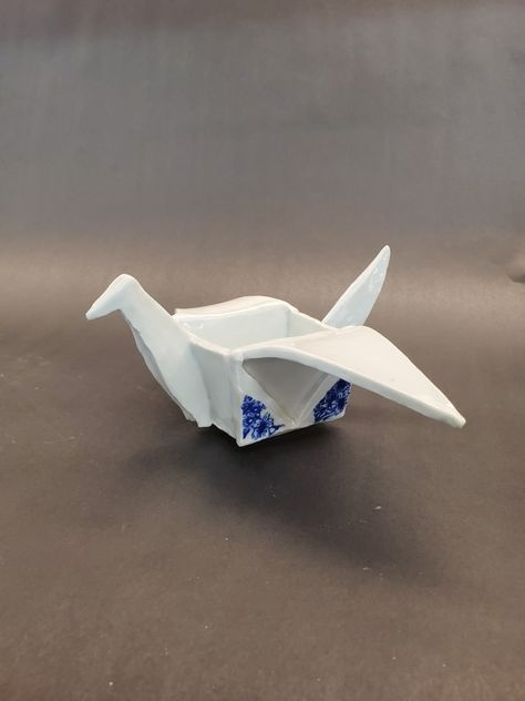 A white paper crane planter made with porcelain hard slabs and decorated with blue floral underglaze transfer Hard Slab Ceramics, Soft Slab Ceramics, Sculpture Relief, Material Studies, Ceramic Projects, Air Clay, Slab Ceramics, Origami Cranes, Slab Pottery