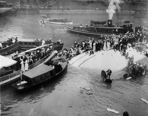 FILE - In this July 24, 1915 file photo, passengers are rescued as they stand atop the Eastland passenger ship after the vessel capsized in the Chicago River in downtown Chicago. Film clips have surfaced of the 1915 disaster that left 844 people dead. The first-known footage of the Eastland disaster was spotted by Jeff Nichols, a doctoral student at the University of Illinois at Chicago who was looking through seemingly unrelated material on World War I. University Of Illinois At Chicago, Chicago Pictures, History Articles, Global City, Chicago History, Chicago River, Film Clips, My Kind Of Town, Today In History