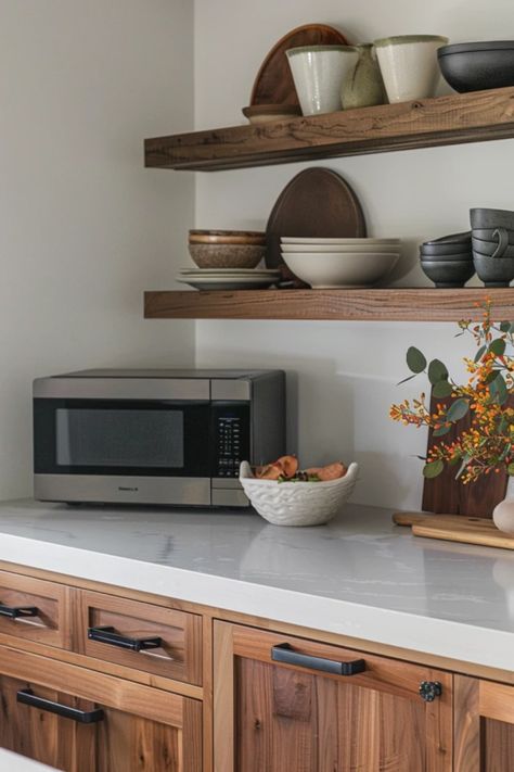 Is your kitchen feeling cramped? Check out these practical and stylish microwave shelf ideas designed to elevate your cooking space! Discover clever designs that maximize functionality while adding character to your kitchen. From floating shelves to compact cabinets, these options will help you free up precious counter space, creating a tidy and organized environment. Perfect for small kitchens, whether you're looking for modern touches or rustic shelving. Explore these tips and transform your culinary area today! Floating Shelves Lower Cabinets, Shelves Above Microwave, Floating Shelves Above Microwave, Microwave Shelf Ideas, Rustic Shelving, Microwave Shelf, Microwave Cabinet, Lower Cabinets, Space Saving Kitchen