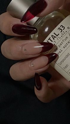 Black And Dark Red Nails Ideas, Prom Nails For A Red Dress, Dark Red Almond Nails Designs, Red Prom Dress Nails, Dark Red Prom Nails, Dark Red Nails With Gems, Dark Red Long Nails, Dark Red Acrylic Nails Design, Nail Inspo Dark Red