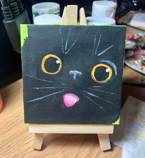 Black Cat Face With Tongue Out 3x3inch CanvasEtsy Black Cat Aesthetic Painting, Black Canvas Art Ideas Paint, Cute Simple Cat Paintings, Mini Canvas Cat Painting, Cute Black Cat Painting, Cat Drawing Canvas, Simple Black Cat Painting, Black Cat Canvas Painting Easy, 2 Cats Painting