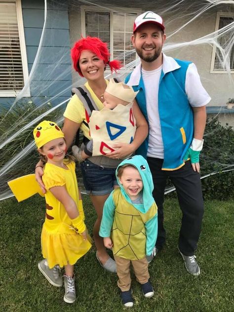 Pokemon family babywearing costume. Baby carrier costume! Infant Pokemon Costume, Disney Baby Costume, Togapee Pokemon Costume, Family Costume Pokemon, Firetruck Family Costume, Family Anime Costumes, Nerdy Family Halloween Costumes, Pokemon Customes Halloween, Pokemon Baby Costume