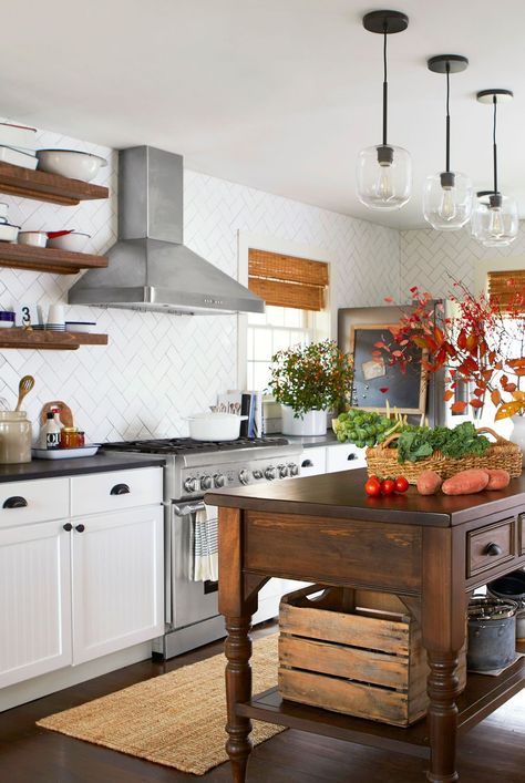 While gourds and pumpkins make excellent fall decorating staples, designers share a few unexpected ways to welcome this cozy season. Discover the best 2023 fall decorating trends. #falldecor #falldecortrends #falldecoratingideas #bhg Modular Farmhouse, Cozy Fall Kitchen, Fall Kitchen Decor Ideas, Open Kitchen Layouts, Fall Kitchen Decor, Farmhouse Kitchens, Rustic Modern Kitchen, Open Kitchen Shelves, Kitchen Decor Ideas