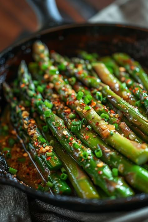 Looking for a quick and delicious side dish? Try this flavorful skillet asparagus recipe tonight! Tender asparagus cooked to perfection in a hot skillet with garlic, lemon, and parmesan cheese. This easy-to-make recipe is perfect for any meal. Serve it alongside your favorite main course or enjoy it on its own. This skillet asparagus dish will become a regular favorite at your dinner table! Asperigus Recipes, Skillet Asparagus, Asparagus On The Stove, Asparagus Side, Tender Asparagus, Asparagus Side Dish, Ways To Cook Asparagus, Cook Asparagus, Easy Asparagus Recipes