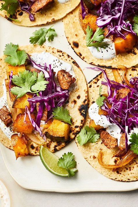 This quick and easy 35-minute acorn squash and chorizo taco recipe incorporates acorn squash, red onions, chorizo, sour cream, lime, cilantro, corn tortillas, red cabbage and hot sauce to create the ultimate comfort food meets fall recipe. Whether you’re looking to eat this acorn squash recipe as a quick and easy weeknight dinner or a fall lunch, it’s a great choice for a comfort food recipe. #tacorecipes #acornsquash #squashrecipes #fallrecipes #weeknightdinners #comfortfood Low Carb Gluten Free Meals, Squash Tacos, Healthy Taco Recipes, Chorizo Tacos, Healthy Taco, Grilled Chicken Tacos, Spicy Shrimp Tacos, Cabbage And Sausage, Healthy Tacos