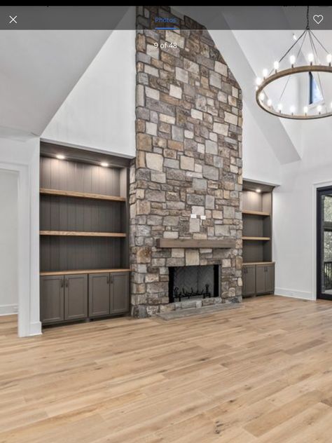 Stone Fireplace On Angled Wall, Full Stone Wall Fireplace, Built In Cabinets Around Fireplace Stone, Rock Fireplace With Built Ins On Both Sides, Rock Fireplace With Built Ins, Stone Fireplace With Built Ins, Stone Fireplace Floor To Ceiling, Acreage Ideas, Rock Veneer