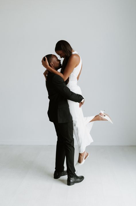 white silk dress, white kitten heels, wedding shoot, black suit, studio photos Kitten Heels Wedding, Silk Dress White, White Kitten Heels, White Silk Dress, White Kitten, Studio Photos, Heels Wedding, Engagement Photo Poses, Minimal Wedding