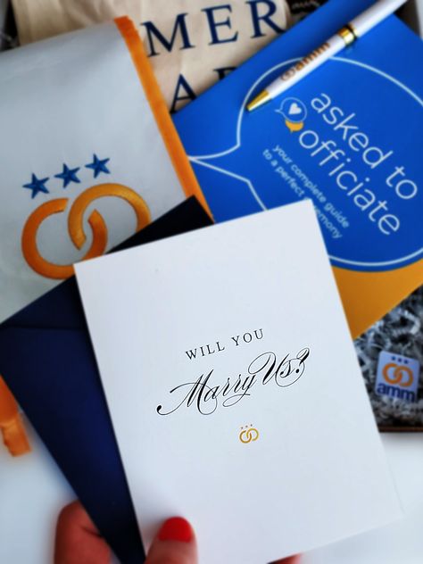 Building on the new tradition of presenting gifts as a way to ask intended bridesmaids and groomsmen, the “Will You Marry Us?” gift box allows couples to share that same excitement and honor with their officiant.   This package includes the most robust ordination available with full credentials and documentation, training and writing tools, and everything else required to craft a personalized and meaningful wedding ceremony. Officiant Asking Ideas, How To Ask Your Officiant To Marry You, Cute Ideas, Wedding 2024, Wedding Officiant, Marry You, Plan Your Wedding, Wedding Tips, On Your Wedding Day