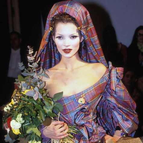 The Vivienne Westwood Archives on Instagram: "Kate Moss in a tartan wedding gown for Vivienne Westwood’s Autumn/ Winter 1993 ‘Anglomania’ collection! This gorgeous wedding gown was the first dress to use the MacAndreas tartan print! One of my favourite gowns ever! 😍 Photos from @voguerunway, @gavinbondphotography and @nationalgalleryaus! #viviennewestwood #katemoss #90sfashion #anglomania #weddinggown #gavinbond" Kate Moss Runway, Kate Mess, Vivienne Westwood Fashion, Tartan Wedding, Vintage Editorials, Model Runway, 90s Runway Fashion, Vivienne Westwood Anglomania, The Vivienne