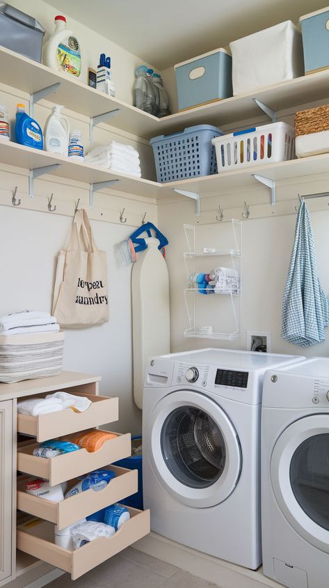 Discover how to create a functional and stylish small laundry room with these space-saving storage solutions and design tips. Compact Laundry Storage, Small Laundry Area Ideas Stackable, Stackable Washer Dryer Laundry Room Small Apartment, Small Laundry Room Organization Stacked, Small Laundry Space Stackable, Small Laundry Room, Space Saving Storage, Tidy Up, Laundry Room