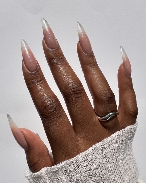 Stills of that glitter set 🤩✨ Created using @lovelecente Show Stopper Loose Glitter and Top Coat on @apresnailofficial Natural Stiletto Long Tips and @dndgel.europe Glass Peach gel #bygabrielleeva #nailinspo #nailart #nailinspo #longnails #bridalnails #glitternails #ombrenails #clearnails #gelxnails Clear Stiletto Nails Design, Clear Glitter Acrylic Nails, Elegant Stiletto Nails, Short Pointy Nails, Opalescent Nails, Medium Stiletto Nails, Natural Stiletto Nails, Ethereal Nails, Gel Nails Glitter