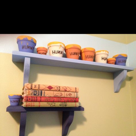 Classic Pooh nursery - I can make the "Hunny Pots" but I WANT those books!! Winnie The Pooh And Sunflower Nursery, Classic Pooh Nursery, Random Decorations, Mickey Room, Library Nursery, Nursery Projects, Deco Disney, Pooh Nursery, Baby Pumpkin