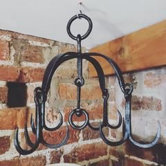 Black Wrought Iron Pot Pan Hanger Pot Hanger Kitchen, Cast Iron Cookware Display, Rustic Pot Racks, Pan Storage Diy, Cookware Display, Pan Hanger, Industrial Shelves, Iron Kitchen, Rustic Pots