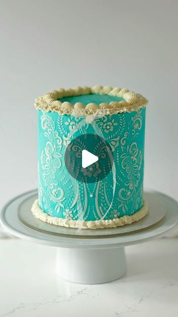 Kathy Choffe | Tutorials and Inspiration on Instagram: "Vintage Coquette Cake!  This was a really easy and fun design to create.  I used a stencil to give the lacy damask effect, ruffle tips, pearl sprinkles and a sheer ribbon to really amp up the coquette vibe.  I also think a monochromatic version of this design would be perfect for a wedding cake, but you can let me know what you think 👉🏻👉🏻

@nycake scraper and round silicone mat
@wiltoncakes 86, 32
@cakesbyangelamorrison stencil

#wiltoncakes #coquettecake #vintagecake #vintagecakes #stencilcake #lacycake #prettycake #prettycakes #bluecake #bluecakes #elegantcake #elegantcakes #ribboncake #beautifulcakes" Stencil Cakes Ideas, Stencil Cake Design, Blue Stencil Cake, Cake Stenciling, Cake With Stencil Design, Blue Victorian Cake, Ribbon Cake, Wilton Cakes, Blue Cakes