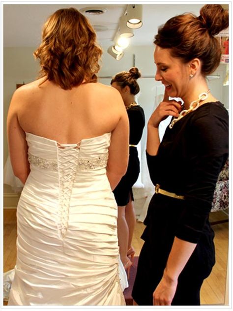 Some of our most popular dresses here at the Shoppe have a stunning corset back that will need to be laced up on your wedding day. Learning how to lace up a corset dress is something you need to do before your big day with whoever will be assisting you. It seems really easy, but there are a couple things you’ll want to be careful of. It’s time to learn how to lace up a wedding dress! Words and pictures can only do so much, so we decided it was time for some action! Check out our how to lace up Lace Engagement Dress, A Corset Dress, Corset Back Wedding Dress, Corset Back Dress, Vow Renewal Wedding, Grad Dresses Short, Green Evening Gowns, Grad Dresses Long, Red Prom Dress Long