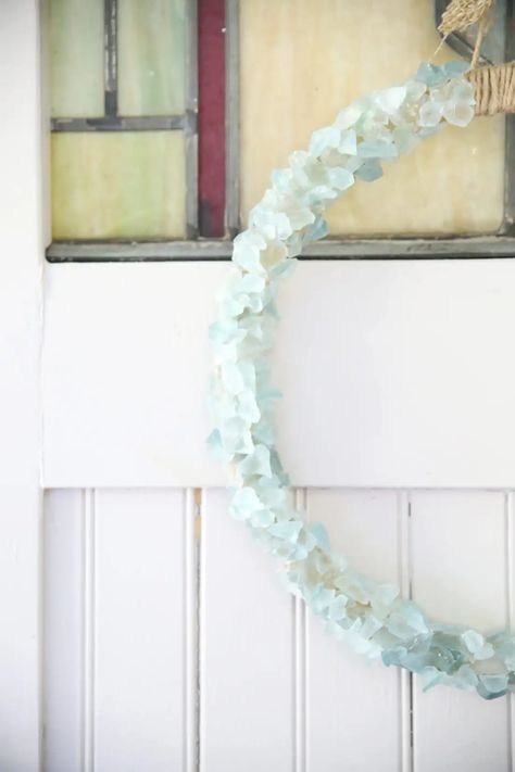 Get ready to bring beach vibes into your home with these 55 stunning beach crafts that will make you feel like you're on a seaside vacation. Diy Wreath Ideas, Sea Glass Candles, Sea Glass Diy, Glass Wreath, Beach Glass Crafts, Thistlewood Farms, Lantern Ideas, Driftwood Wall Art, Glass Art Projects