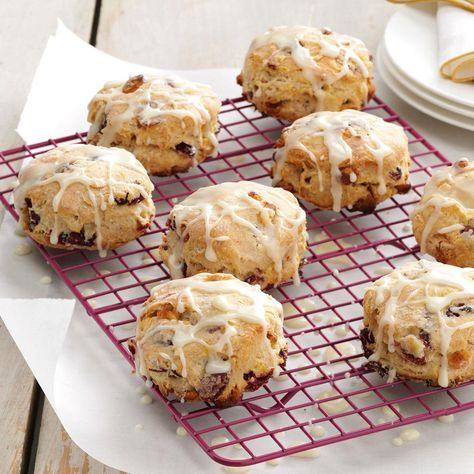 Glazed Cranberry Biscuits Recipe -My family likes biscuits for breakfast. One Sunday, I decided to make those golden goodies extra special by adding white chips, dried cranberries and a simple orange glaze. Cranberry Biscuits, Gains Recipes, Virginia Recipes, Best Biscuit Recipe, Cranberry Bread Recipes, Joanna Gaines Recipes, Best Biscuits, Freezer Jam Recipes, Cheesy Biscuit