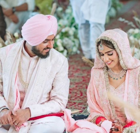 Popular playback singer, Asees Kaur is on cloud nine as she embarked on a new journey with her beau, Goldie Sohel. The much-in-love couple tied the knot on June 17, 2023, in an intimate Anand Karaj ceremony. And now we got hold of some beautiful glimpses from their intimate wedding ceremony and they are simply adorable. For the unversed, Asees rose to fame after her romantic track, Raatan Lambiyaan from the film, Shershaah got released in 2020. 
 
 Singer, Asees Kaur gets married to m... Nimrat Kaur Ahluwalia, Blush Pink Outfit, Engagement News, Bollywood Music, Bollywood Cinema, Blush On Cheeks, Intimate Wedding Ceremony, Beautiful Love Stories, How To Look Handsome