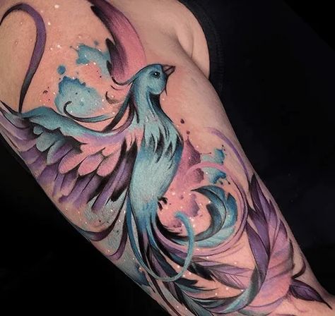 Renewal, Rebirth, Restart - Phoenix Tattoo Guide for 2020 - Tattoo Stylist Phenix Tattoo Forearm, Watercolor Phoenix Tattoo For Women, Phoenix Tattoo Ideas For Women, Phoenix Leg Tattoo, Phenix Tattoo For Women, Rebirth Tattoo New Beginnings, Phoenix Tattoo Design Feminine, Pheonix Tattoo For Women, Fire Phoenix Tattoo