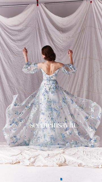 SAVIN LONDON on Instagram: "Blue Mondays… 🦋 Evelyna - our beautiful handpainted blue beauty, a statement silhouette with angelic design at her heart. Could she be your something blue? #savinlondon #seemeinsavin #mondaymood #blueweddingdress #handpaintedweddingdress #handpainteddress #somethingblue" Hand Painted Wedding Dress, Savin London, Vogue Bridal, Elegant Bridal Dress, London 2023, Hand Painted Dress, Bridal Consultant, Blue Wedding Dresses, Bridal Dress Design